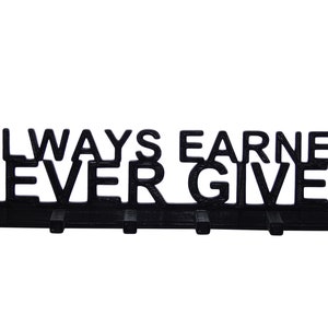 May include: Black metal key holder with the words "Always Earned Never Given" in raised lettering. The holder has six hooks.