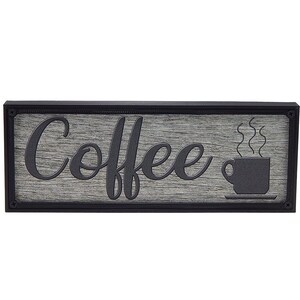 May include: A black framed wooden sign with the word "Coffee" in a stylized font and a black silhouette of a coffee cup with steam rising from it.