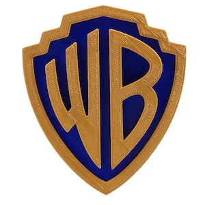 May include: A gold shield-shaped logo with the letters "WB" in blue inside. The logo is a popular symbol for Warner Bros. Entertainment.