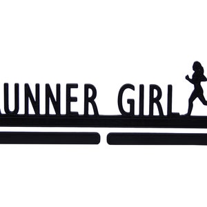 May include: Black metal medal holder with the words "RUNNER GIRL" and a silhouette of a runner.