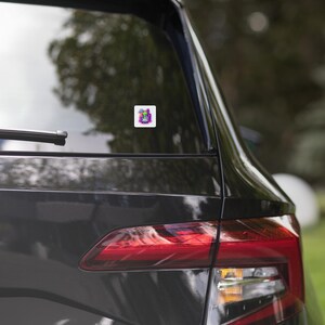 Sticker en vinyle Alien mignon avec plaque « Help »