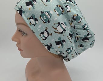 Christmas Penguins on Ice Scrub Hat: Teal Blue Several Styles in Buttery Soft Stretchy Fabric