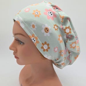 May include: A rustic wooden sign with the text "Welcome to our home" in a handwritten style. The sign features a distressed finish and a simple, inviting design, perfect for a front porch or entryway.