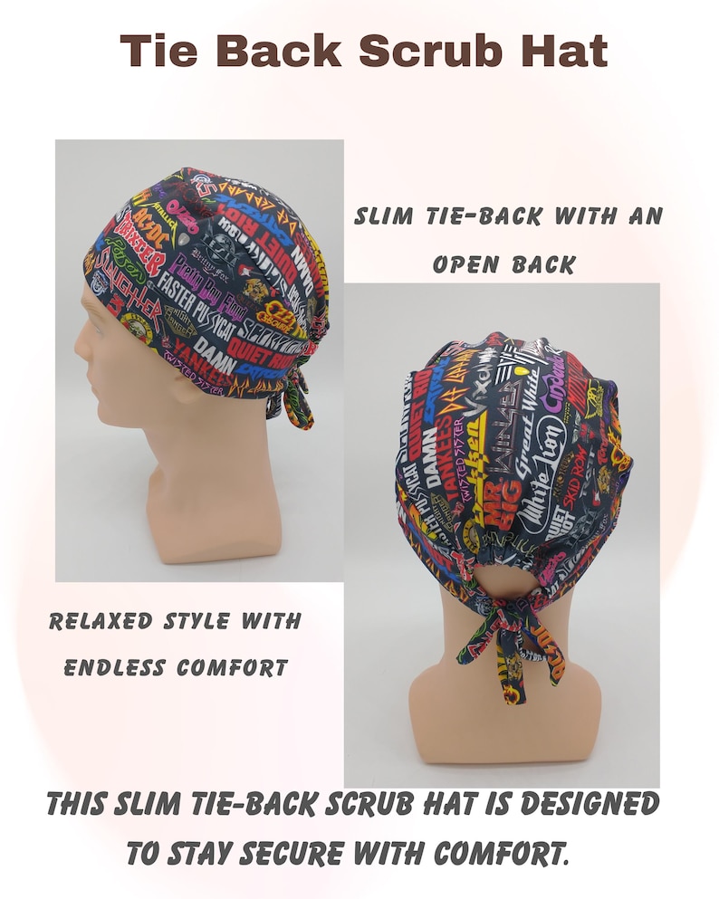 May include: A black tie-back scrub hat with a colorful print featuring band names and text. The hat has an open back and is designed to stay secure with comfort. The text on the hat includes "AC/DC" and "Faster Pussycat".