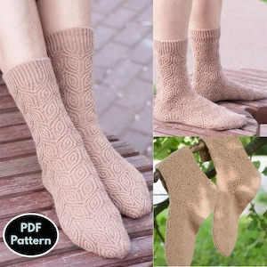 May include: A pair of beige knitted socks with a geometric pattern. The socks are shown on a wooden surface and on a branch. The image includes the text "PDF Pattern".
