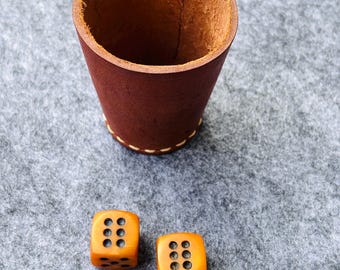 Vintage Bakelite dice set with leather cup