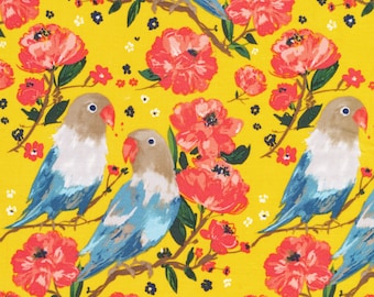 May include: A seamless pattern featuring blue and brown lovebirds perched on branches with pink flowers on a yellow background.