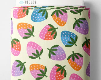 May include: A bolt of fabric featuring a repeating pattern of stylized strawberries in shades of pink, orange, blue, and purple on a cream background. Each strawberry has green leaves and white seeds. The top edge displays the text CLOUD9.