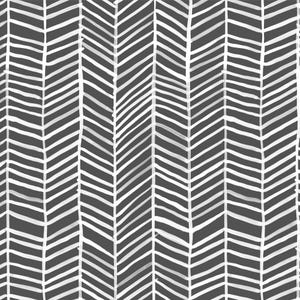 May include: A seamless pattern of white chevron stripes on a dark gray background. The stripes are hand-drawn and have a slightly uneven texture.