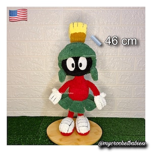 May include: A set of three ceramic mugs with a speckled, matte finish. The mugs are in shades of blue, green, and white. Each mug has a simple, modern design, perfect for coffee or tea.