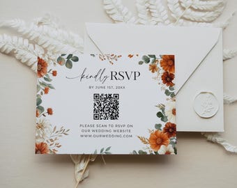May include: A white RSVP card and envelope with floral accents in orange, green, and white. The card includes the text "kindly RSVP" and a QR code. The envelope has a wax seal.