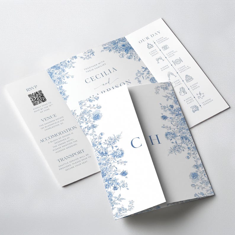 Elegant dusty blue toile gatefold wedding invitation with a classic French toile floral pattern in soft blue on an ivory background. The tri-fold gatefold design opens to reveal the main invitation centered with refined serif typography and a delicate script accent. The left interior panel includes an RSVP section with QR code, venue, accommodations, and transportation details, while the right panel displays a wedding day timeline with minimal line icons. Editable printable Canva template.