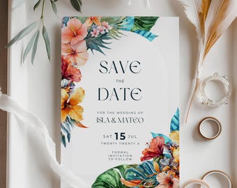 May include: A white wedding invitation with the text "SAVE THE DATE" and floral accents. The invitation includes the names Isla & Mateo and the date July 15, Twenty Twenty X. Tropical flowers and greenery frame the text.