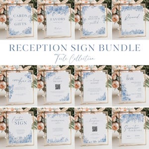May include: A collection of framed wedding reception signs with gold frames and floral accents. The signs include text such as "Cards & Gifts", "Favors", "Please Sign Our Guestbook", and "Reserved". The signs are part of the "Toile Collection".