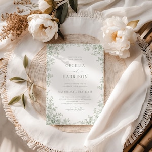 Editable green toile wedding invitation template featuring sage chinoiserie floral design, vintage French toile de Jouy pattern, and traditional elegant wedding card style