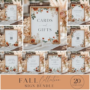 May include: A collection of framed signs with floral borders and gold frames. The signs include text such as "Cards and Gifts", "Favors", and "Fall Collection". The signs are decorated with fall-themed flowers and greenery.