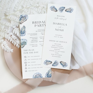 May include: Wedding stationery set featuring a bridal party list and order of service. The white cards have watercolor oyster shell illustrations in blue and gray. The text includes the names Isabella and Noah, and the date July 15, 20xx.