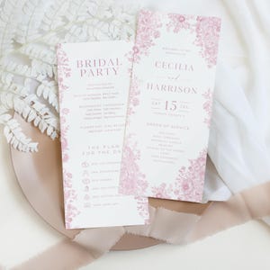 May include: Two wedding programs with floral designs and text. One program reads "Bridal Party" and the other reads "Welcome to the Wedding of Cecilia and Harrison." The programs are on a light pink plate.