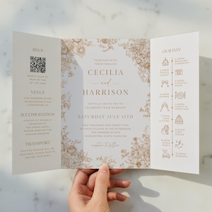 May include: A tri-fold wedding invitation in beige and brown with a floral design. The invitation features the names Cecilia and Harrison, the wedding date, time, and location. The invitation also includes the wedding day schedule.