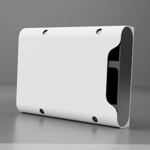 Può includere: Un prodotto rettangolare bianco con bordi arrotondati e un design curvo su un lato. Il prodotto ha quattro piccoli fori circolari neri e un interno grigio scuro. L'oggetto è posto su uno sfondo grigio.