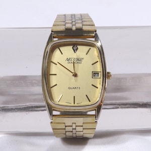 Nelsonic top diamond watch