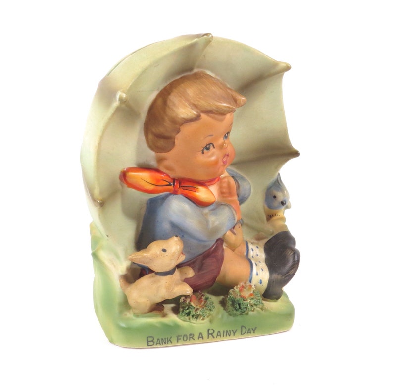 hummel boy with umbrella