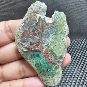 May include: A rustic wooden sign with the text "Welcome to our home" in white lettering. The sign features a distressed finish and a simple, inviting design, perfect for entryway decor.