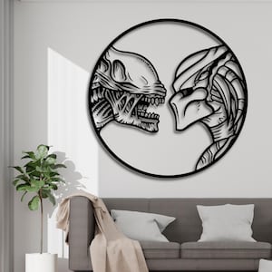 May include: Black and white silhouette of an alien and a predator facing each other in a circle. The alien is on the left and the predator is on the right. The image is a wall decor piece.