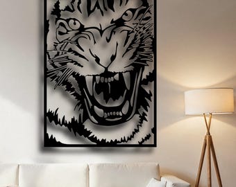 May include: Black and white metal wall art featuring a close-up of a tiger's face with an open mouth and sharp teeth.
