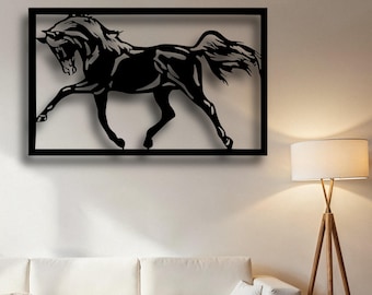 May include: Black metal wall art featuring a silhouette of a horse running in a rectangular frame.