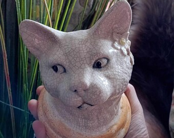 Cat head sculpture