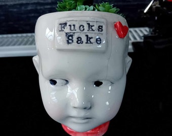 Ceramic doll head succulent planter FUCKS SAKE