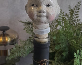 Ceramic doll head bah humbug christmas bottle stopper