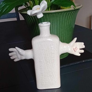 handmade vintage style medicine bottle posy vase with ceramic flower