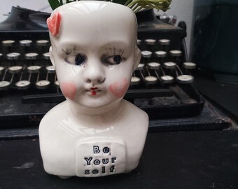 Doll head succulent planter