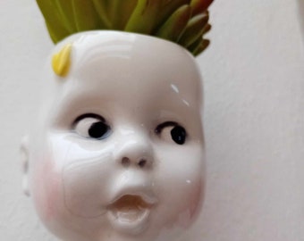 Ceramic doll head succulent planter