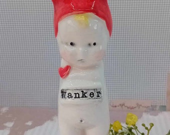 ceramic doll bunny ears "WANKER"