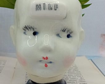 milf   ceramic doll head succulent planter