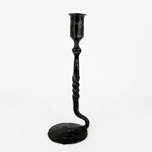 Signed wrought iron candle holder