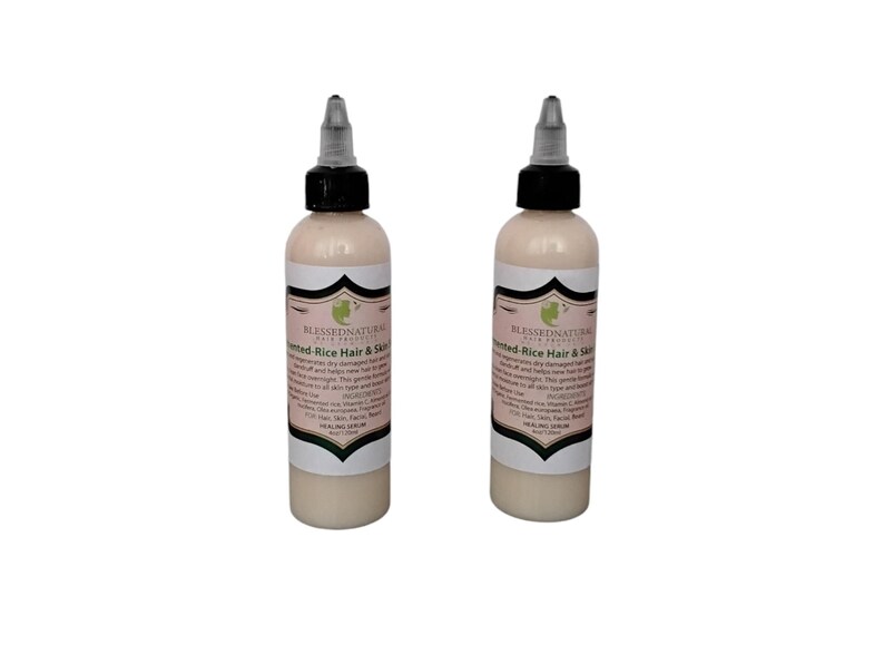 May include: Two 4 oz bottles of Fermented Rice Hair & Skin Serum by Blessed Natural Hair Products. The bottles are clear with a white liquid inside and black caps with a white tip.