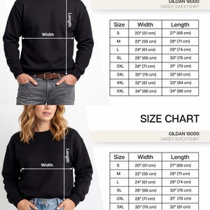 K&ouml;nnte beinhalten: Schwarzes Unisex-Sweatshirt mit Gr&ouml;&szlig;entabelle. Die Tabelle zeigt Ma&szlig;e f&uuml;r die Gr&ouml;&szlig;en S bis 5XL, mit Breiten von 51 cm bis 86 cm und L&auml;ngen von 69 cm bis 86 cm. Das Sweatshirt ist von Gildan.