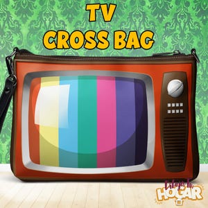 Könnte beinhalten: Eine rechteckige Umhängetasche im Design eines Vintage-Fernsehers. Die Tasche zeigt einen Bildschirm mit vertikalen Farbbalken, ein braunes Seitenteil mit einem runden Drehknopf und eine schwarze Handschlaufe. Der Text TV CROSS BAG steht darüber.