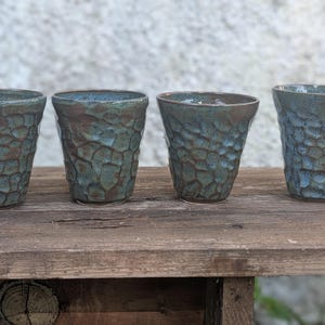 4 handmade ceramic mugs