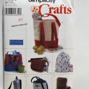 May include: Simplicity Crafts sewing pattern number 9658 for making six different bags. The pattern includes instructions for a tote bag, a drawstring bag, a crossbody bag, a water bottle holder, and two different styles of lunch bags. The pattern is for one size.
