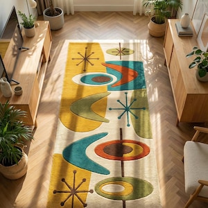 May include: A rectangular area rug featuring a cream-colored background with a repeating pattern of abstract shapes in mustard yellow, teal, olive green, and burnt orange. The design includes starburst motifs and curved boomerang-like forms.