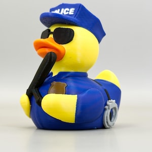 Police Duck: Law enforcement themed duck, cruise hiding, cop friends