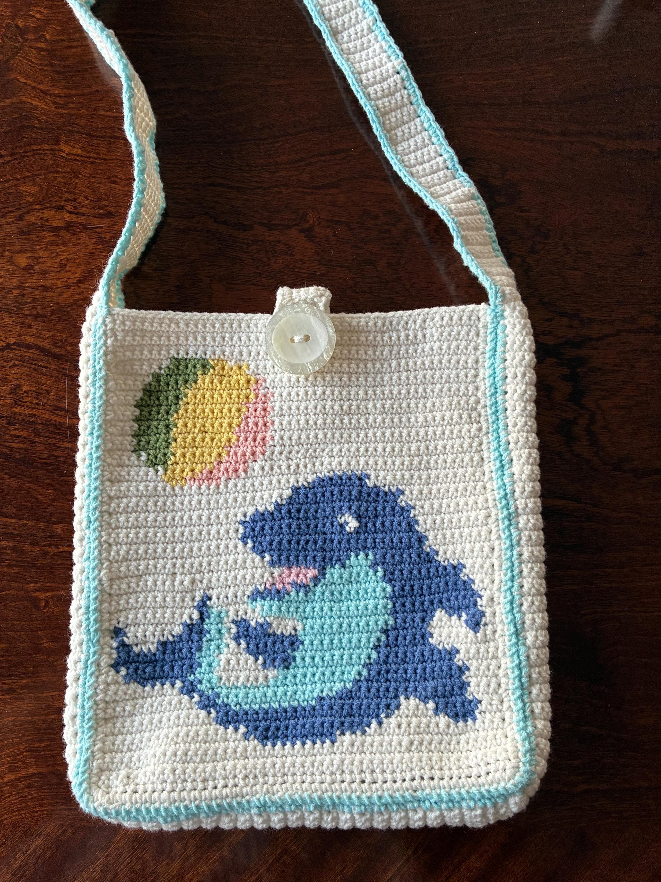 40 Dolphin Crochet Patterns for Ocean-Inspired Amigurumi, Gifts, and Nursery Decor 35 Dolphin Crochet Bag Pattern: Beginner-Friendly Intarsia (
