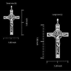 May include: Two silver crucifix pendants, one small (2.54 cm wide, 3.56 cm tall) and one large (3.05 cm wide, 4.57 cm tall). Each features a detailed depiction of Jesus on the cross, with the letters INRI above. The larger pendant has additional circular detailing.