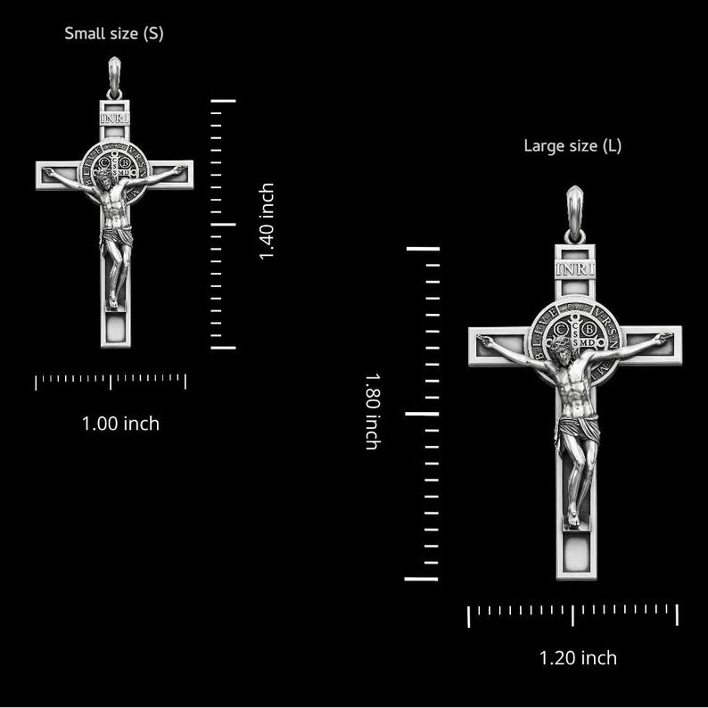 May include: Two silver crucifix pendants, one small (2.54 cm wide, 3.56 cm tall) and one large (3.05 cm wide, 4.57 cm tall). Each features a detailed depiction of Jesus on the cross, with the letters INRI above. The larger pendant has additional circular detailing.