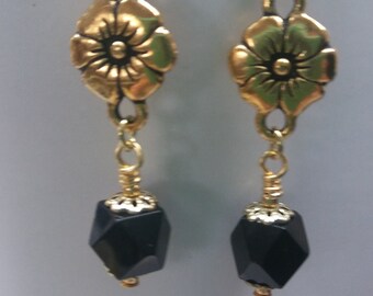 Flower Connector with Black Faceted Bead in Gold Tones Dangle Earrings